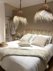 Maisons de vacances LA PAUSE - 3 villas avec Jacuzzi privatif a chisa : photos des chambres