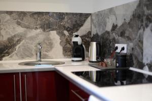 Appartements Appart Hotel avec Sauna, Jacuzzi, : photos des chambres