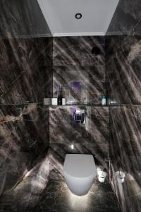 Appartements Appart Hotel avec Sauna, Jacuzzi, : photos des chambres