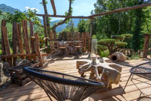 Maisons de vacances LA PAUSE - 3 villas avec Jacuzzi privatif a chisa : photos des chambres