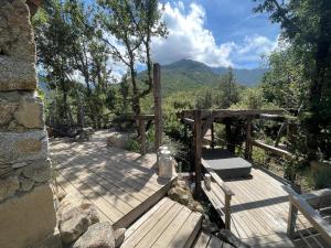 Maisons de vacances LA PAUSE - 3 villas avec Jacuzzi privatif a chisa : photos des chambres