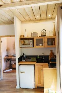 Maisons de vacances LA PAUSE - 3 villas avec Jacuzzi privatif a chisa : photos des chambres