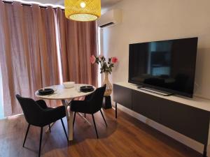 Appartements La Roseraie du Chateau climatise! : photos des chambres