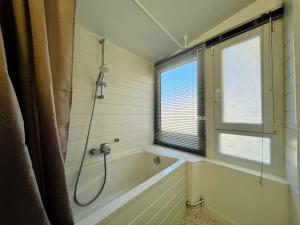 Appartements The Duplex des Flots In the heart of Grandcamp just steps from the beach : photos des chambres