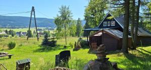 Domek Adam z widokiem na góry Lasówka