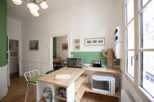 Appartements La Luciole : photos des chambres