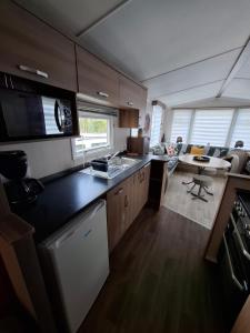 Campings Mobilhome kerou 1 : photos des chambres