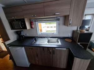 Campings Mobilhome kerou 1 : photos des chambres