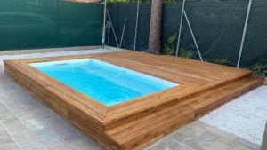 MIMA61 - Appartamento con piscina, giardino e posti auto a 50mt dal centro