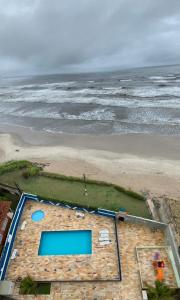 APTO PÉ na AREIA com Piscina - Centro Itanhaem