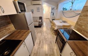 Awesome Home In Risika With Kitchen