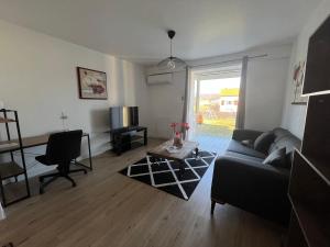 Appartements appartement tout confort dans villa avec piscine : photos des chambres