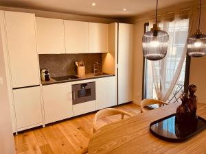 La Maison Cavet 5 Appartements de standing au coeur du village : photos des chambres