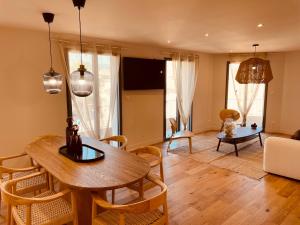 La Maison Cavet 5 Appartements de standing au coeur du village : photos des chambres