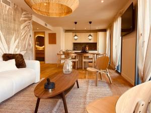 La Maison Cavet 5 Appartements de standing au coeur du village : photos des chambres