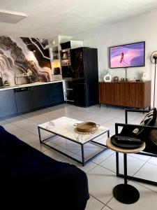 Appartements Bel appartement T3 avec jardin Malibu Village : photos des chambres