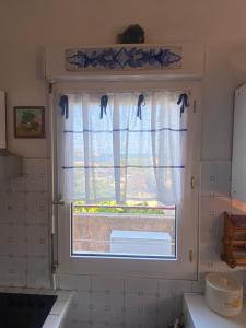 Appartements Trilocale vista mare : photos des chambres