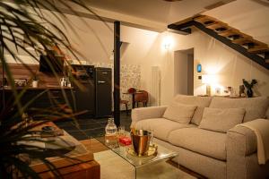 Appartements La Parenthese Suites - appartement luxueux avec sauna et baignoire balneo : photos des chambres