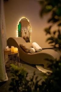 Appartements La Parenthese Suites - appartement luxueux avec sauna et baignoire balneo : photos des chambres