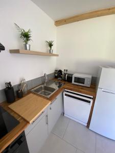 Appartements La grange du clos : photos des chambres