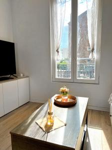 Appartements Cosy studio, a deux pas de Paris : photos des chambres