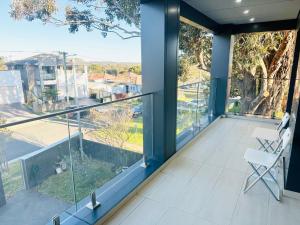 Cozy Room with Private Bathroom, Toilet and Balcony Close to Train Station and Airport