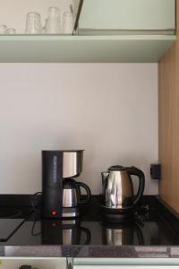 Lou Suítes - Suíte 03 com 2 camas de casal - Conforto para sua Família