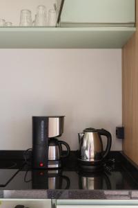 Lou Suítes - Suíte 04 - Econômica com Estilo