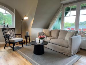 Ferienwohnung Nr 10 OG Spitzboden - 3hvězdičkové hotely ve městě Born