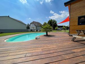 Maisons de vacances Chez Seb piscine et parking proche Mulhouse : photos des chambres