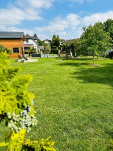 Maisons de vacances Chez Seb piscine et parking proche Mulhouse : photos des chambres