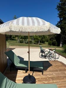 Lodges Tiny House Mon Cabanon grand jardin terrasse climatisation : photos des chambres