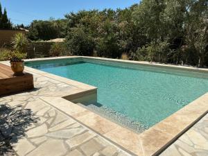 Maisons de vacances Jolie villa au calme climatisee grande piscine jardin : photos des chambres