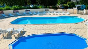 Campings Mobil-home V 3 chambres, climatise, cuisine equipee, TV & Wi-Fi : photos des chambres