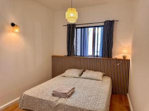 Appartements Coup de coeur en centre-ville : photos des chambres