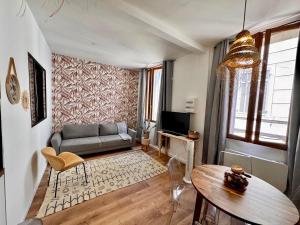 Appartements Coup de coeur en centre-ville : photos des chambres