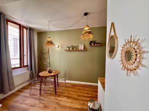 Appartements Coup de coeur en centre-ville : photos des chambres