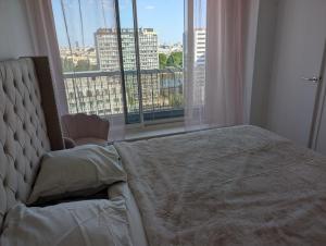 Vue imprenable sur Paris situé à Courbevoie - La Défense