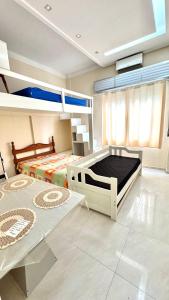 Studio 102 Pitangueiras no térreo - ar condicionado - na quadra da praia!