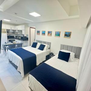 Flat com piscina a 50m da praia