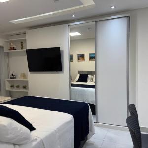 Flat com piscina a 50m da praia