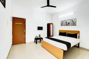 Super Collection O Ambattur Near Patravakam Railway Station