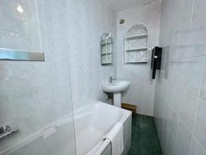 Appartements Chez Romane - appartement avec parking : photos des chambres