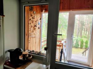 Homey apartment facing a pine forest