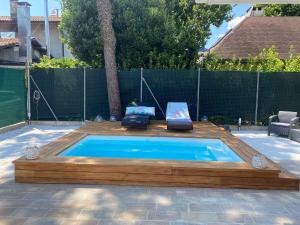 MIMA61 - Appartamento con piscina, giardino e posti auto a 50mt dal centro