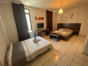 Appartements Studio Cite medievale 250 m : photos des chambres