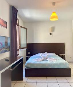 Appartements Studio Cite medievale 250 m : photos des chambres