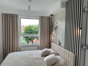 Nowy apartament z dwoma sypialniami i garażem