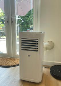 Self-contained studio with folding down Bed