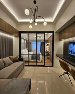 Luxury apartment at Park McKinley West suite 1 - 3-звездочные отели в городе Манила
